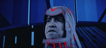 Movie still from “Tron” (1982), directed by Steven Lisberger – A painting of a man with a helmet on his head; Close Up shot, Low angle