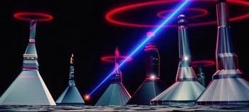 Movie still from “Tron” (1982), directed by Steven Lisberger – An image of a group of rockets in the night sky; Extreme Wide shot, Low angle