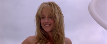 Movie still from “Twister” (1996), directed by Jan de Bont – A person with long blonde hair; Close Up shot, Low angle