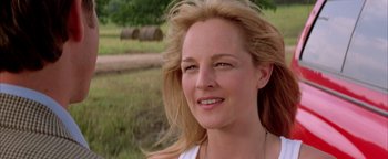 Movie still from “Twister” (1996), directed by Jan de Bont – A person with blonde hair; Close Up shot, Over the shoulder angle