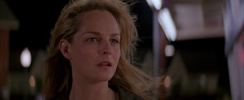 Movie still from “Twister” (1996), directed by Jan de Bont – A person with long blonde hair; Close Up shot, Low angle