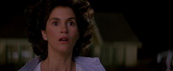 Movie still from “Twister” (1996), directed by Jan de Bont – A person with her eyes wide open; Close Up shot, Low angle