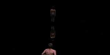 Movie still from “Under the Skin” (2013), directed by Jonathan Glazer – A man standing in front of a mirror and a woman standing in front of a mirror; Extreme Wide shot, High angle