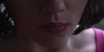 Movie still from “Under the Skin” (2013), directed by Jonathan Glazer – View of a woman's lips; Extreme Close Up shot, Low angle