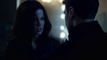 Movie still from “Underworld: Blood Wars” (2016), directed by Anna Foerster – A man and a woman talking in the dark; Close Up shot, Over the shoulder angle