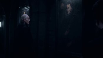 Movie still from “Underworld: Blood Wars” (2016), directed by Anna Foerster – An older man standing next to a painting of a woman; Close Up shot, Over the shoulder angle