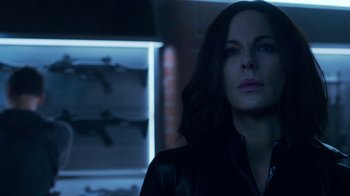 Movie still from “Underworld: Blood Wars” (2016), directed by Anna Foerster – A woman in a black jacket looking at the camera; Close Up shot, Over the shoulder angle