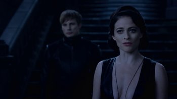 Movie still from “Underworld: Blood Wars” (2016), directed by Anna Foerster – A man and a woman standing next to each other in front of a staircase; Close Up shot, Over the shoulder angle