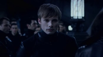 Movie still from “Underworld: Blood Wars” (2016), directed by Anna Foerster – A man in a black jacket is looking at the camera; Close Up shot, Over the shoulder angle