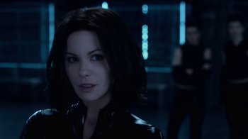 Movie still from “Underworld: Blood Wars” (2016), directed by Anna Foerster – A person wearing a leather jacket; Close Up shot, Over the shoulder angle