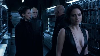 Movie still from “Underworld: Blood Wars” (2016), directed by Anna Foerster – A group of people standing next to each other in a room; Medium shot, Over the shoulder angle