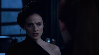 Movie still from “Underworld: Blood Wars” (2016), directed by Anna Foerster – A woman in a black dress looking at another woman in a black dress; Close Up shot, Over the shoulder angle
