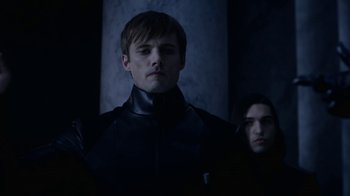 Movie still from “Underworld: Blood Wars” (2016), directed by Anna Foerster – A man in a leather jacket standing next to another man in a leather jacket; Medium shot, Low angle