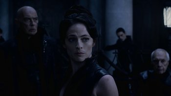 Movie still from “Underworld: Blood Wars” (2016), directed by Anna Foerster – A woman in a black dress and a man in a black suit; Close Up shot, Over the shoulder angle
