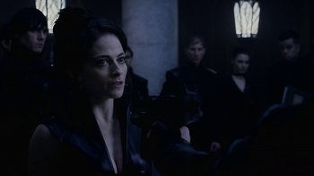 Movie still from “Underworld: Blood Wars” (2016), directed by Anna Foerster – A group of people standing in a dark room; Close Up shot, Over the shoulder angle