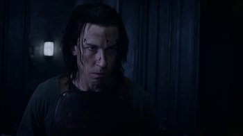 Movie still from “Underworld: Blood Wars” (2016), directed by Anna Foerster – A person with a knife on his face; Close Up shot, Low angle