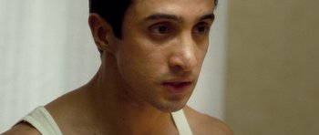 Movie still from “United 93” (2006), directed by Paul Greengrass – A man's face in a mirror; Close Up shot, Over the shoulder angle