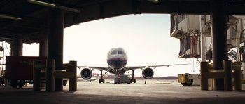 Movie still from “United 93” (2006), directed by Paul Greengrass – An airplane sitting on the tarmac at an airport; Extreme Wide shot, Low angle