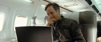 Movie still from “United 93” (2006), directed by Paul Greengrass – A man sitting in front of an open laptop computer; Close Up shot, Low angle