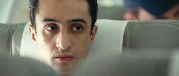 Movie still from “United 93” (2006), directed by Paul Greengrass – A man's face as he looks at the camera; Close Up shot, Low angle