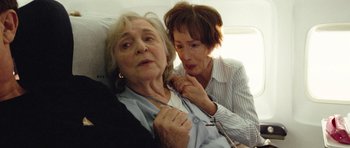 Movie still from “United 93” (2006), directed by Paul Greengrass – An older woman and a younger woman in a hospital bed; Close Up shot, High angle
