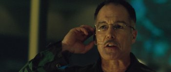 Movie still from “United 93” (2006), directed by Paul Greengrass – A person talking on a cell phone; Close Up shot, Low angle