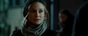 Movie still from “Unknown” (2011), directed by Jaume Collet-Serra – A person wearing a scarf; Close Up shot, Over the shoulder angle