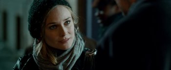 Movie still from “Unknown” (2011), directed by Jaume Collet-Serra – A person wearing a scarf; Close Up shot, Over the shoulder angle