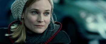 Movie still from “Unknown” (2011), directed by Jaume Collet-Serra – A person wearing a jacket; Close Up shot, Over the shoulder angle