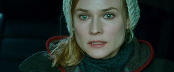 Movie still from “Unknown” (2011), directed by Jaume Collet-Serra – A person wearing a hat; Close Up shot, Over the shoulder angle