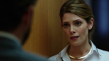 Movie still from “Urge” (2016), directed by Aaron Kaufman – A person wearing a white shirt; Close Up shot, Over the shoulder angle