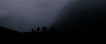 Movie still from “Valhalla Rising” (2009), directed by Nicolas Winding Refn – A group of people standing on top of a hill; Extreme Wide shot, Low angle