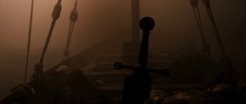 Movie still from “Valhalla Rising” (2009), directed by Nicolas Winding Refn – The handle of a sword in the fog; Close Up shot, Low angle