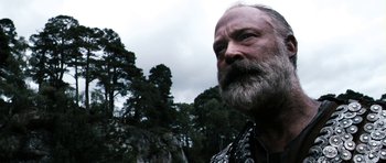 Movie still from “Valhalla Rising” (2009), directed by Nicolas Winding Refn – An older man with a beard and a mustache; Close Up shot, Low angle