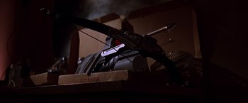 Movie still from “Vampires” (1998), directed by John Carpenter – An arrow that is sitting on a box; Extreme Close Up shot, High angle