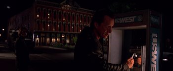 Movie still from “Vampires” (1998), directed by John Carpenter – A man standing in front of an open refrigerator at night; Close Up shot, Low angle