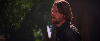 Movie still from “Vampires” (1998), directed by John Carpenter – A person with long hair; Close Up shot, Low angle