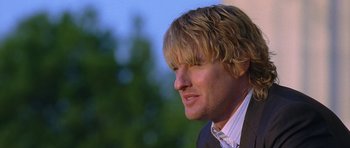 Movie still from “Wedding Crashers” (2005), directed by David Dobkin – A person wearing a suit and tie; Close Up shot, Low angle