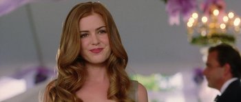 Movie still from “Wedding Crashers” (2005), directed by David Dobkin – A beautiful young woman with long , red hair; Close Up shot, Over the shoulder angle