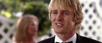 Movie still from “Wedding Crashers” (2005), directed by David Dobkin – A person wearing a suit and tie; Close Up shot, Low angle