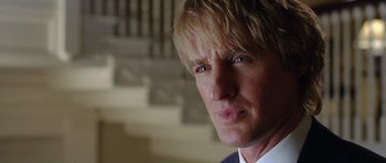 Movie still from “Wedding Crashers” (2005), directed by David Dobkin – A man's face in front of a staircase; Close Up shot, Low angle