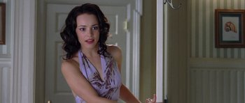 Movie still from “Wedding Crashers” (2005), directed by David Dobkin – A beautiful young woman in a purple dress; Close Up shot, Over the shoulder angle