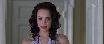 Movie still from “Wedding Crashers” (2005), directed by David Dobkin – A person with long hair; Close Up shot, Over the shoulder angle