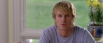 Movie still from “Wedding Crashers” (2005), directed by David Dobkin – A person with long blonde hair; Close Up shot, Over the shoulder angle