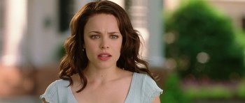 Movie still from “Wedding Crashers” (2005), directed by David Dobkin – A person with long brown hair; Close Up shot, Over the shoulder angle