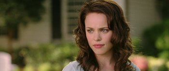 Movie still from “Wedding Crashers” (2005), directed by David Dobkin – A person with long hair; Close Up shot, Over the shoulder angle