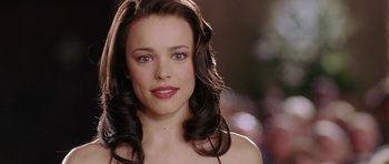 Movie still from “Wedding Crashers” (2005), directed by David Dobkin – A person with long hair; Close Up shot, Over the shoulder angle