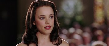 Movie still from “Wedding Crashers” (2005), directed by David Dobkin – A person wearing a dress; Close Up shot, Over the shoulder angle