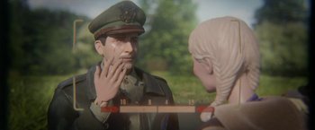 Movie still from “Welcome to Marwen” (2018), directed by Robert Zemeckis – A toy soldier is touching a woman's face; Extreme Close Up shot, Over the shoulder angle