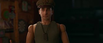 Movie still from “Welcome to Marwen” (2018), directed by Robert Zemeckis – A man wearing a military uniform and a hat; Close Up shot, Low angle